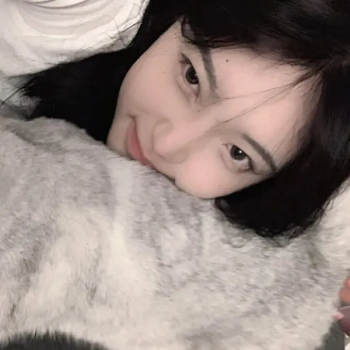 照片的她
